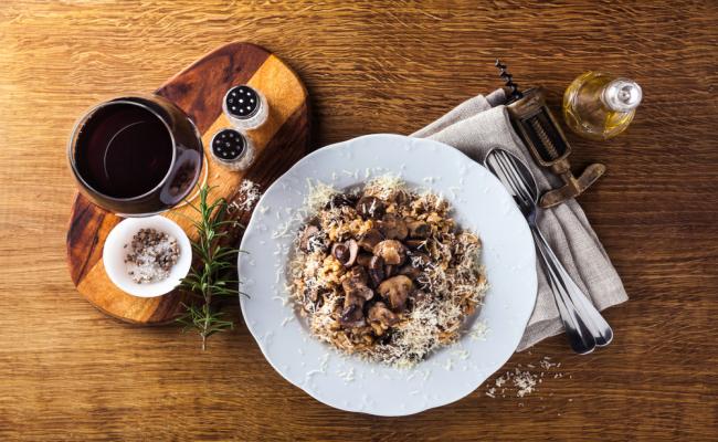 Italian,Risotto,With,Mushrooms,And,Parmesan,Cheese,In,A,Plate